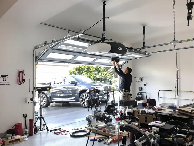 Mount Holly Garage Door Repair specialist installing smart garage door opener system in Mount Holly home